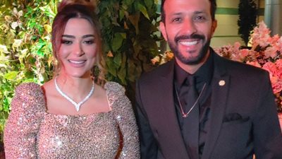 أحمد عصام فى أحدث ظهور برفقة زوجته من حفل زفاف ابنة الكابو