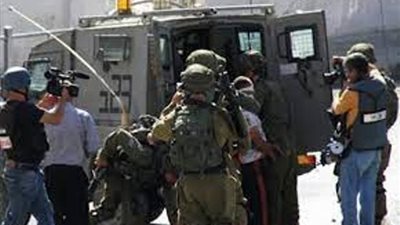 قوات الاحتلال تعتقل 14 فلسطينيا فى نابلس