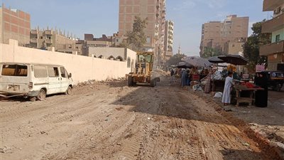 توسعة وتسوية شوارع بمدينة منفلوط